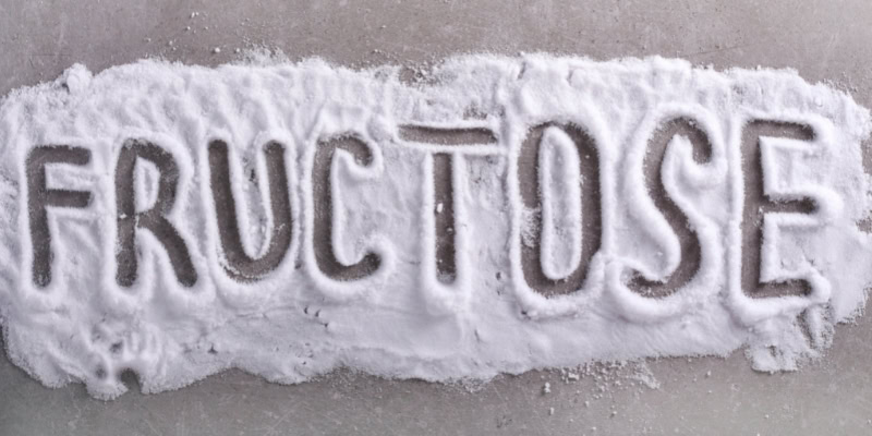Wort 'Fructose' in Zucker geschrieben